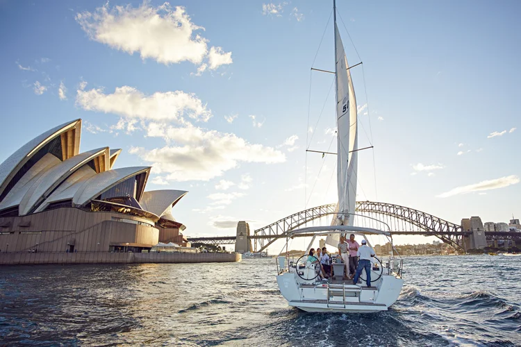 Private catamaran ride in front of the Sydney Opera House in Australia.