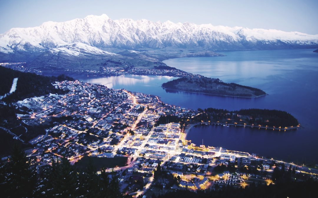 Stunning aerial view of Queenstown, NZ, during the snowy season.